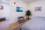 Bedroom also features a flat screen tv